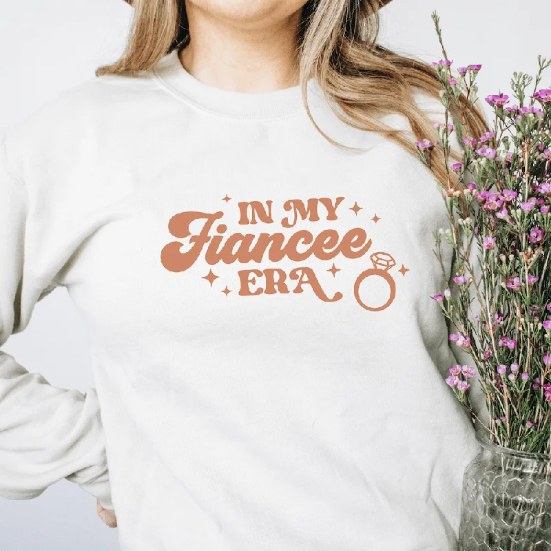 Dress up or down with these versatile pieces   In My Fiancee Era Sweatshirt