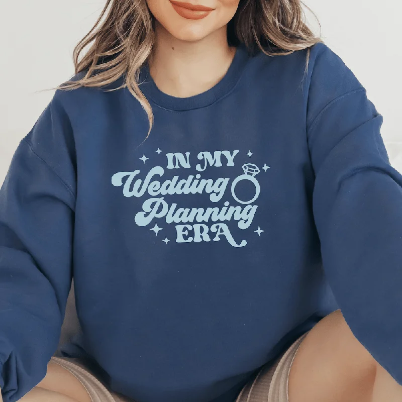Refresh your wardrobe with stylish women’s outfits In My Wedding Planning Era Sweatshirt Refresh your wardrobe with stylish women’s outfits In My Wedding Planning Era Sweatshirt